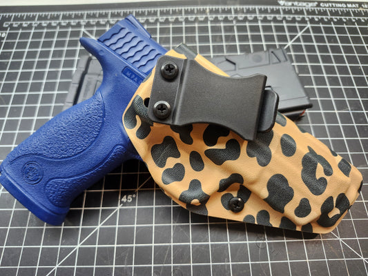 IWB Custom Kydex holster in specialty leopard print. Adjustable cant and retention.